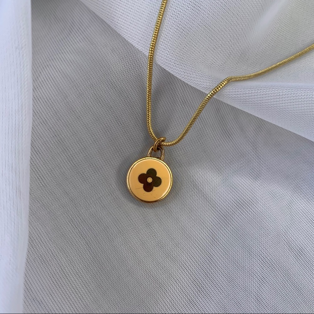 Louis Vuitton charm with necklace (authentic)